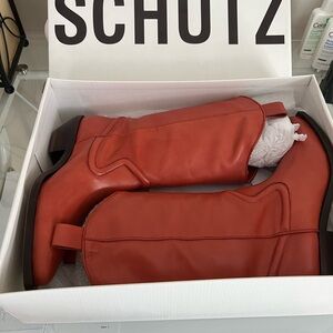 SCHUTZ Red Suede Heeled Boots with Relaxed Design